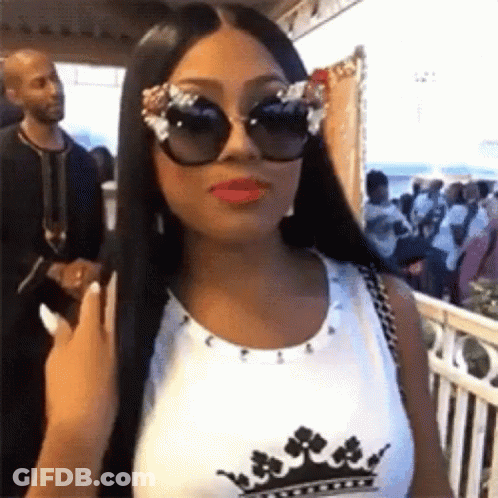 Woman Facing Crowd Sunglasses Crown Tank Top GIF
