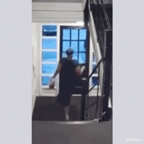 Woman Fall Out Of Stairs GIF