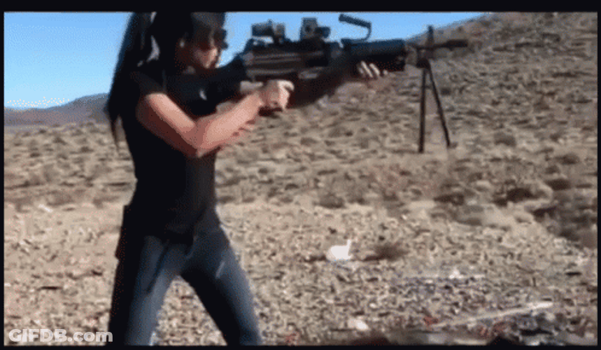 Woman Firing A Machine Gun GIF