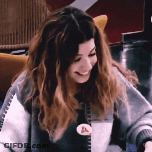 Woman Fixing Her Hair Sensible Chuckle GIF