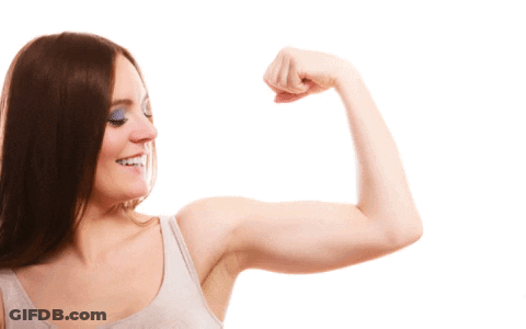 Woman Flexing Arm And Smiling GIF