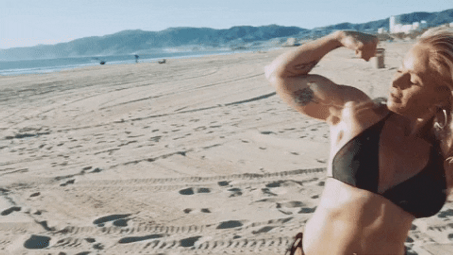 Woman Flexing Her Body Muscle Growth GIF