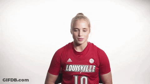 Woman Flexing Muscles In Red Louisville Jersey GIF