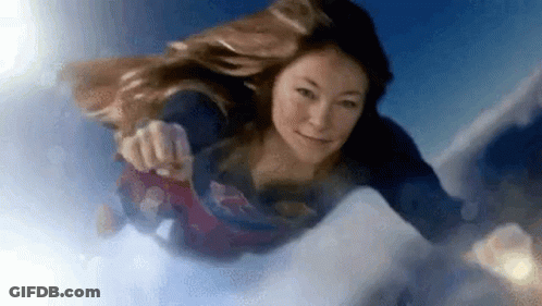 Woman Flying In Superman Costume GIF