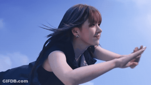 Woman Flying With Hands Outstretched GIF