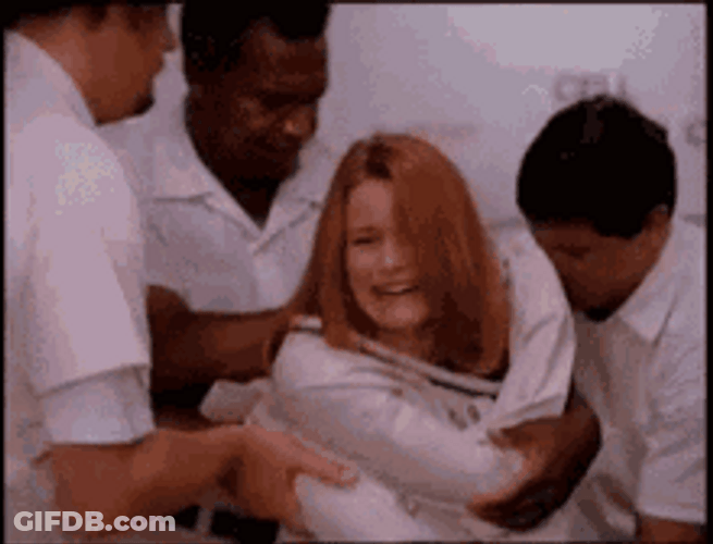 Woman Getting Dragged In Straight Jacket GIF
