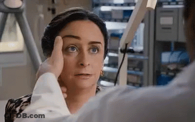 Woman Getting Eye Exam From Doctor GIF