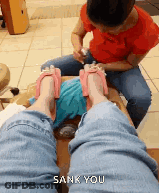 Woman Getting Feet Painted At Nail Salon GIF