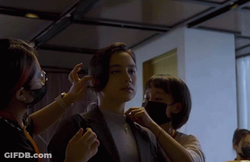 Woman Getting Hair Done By Two Masked Women GIF