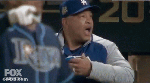 Woman Getting Haircut By Hairdresser In MLB Shirt GIF