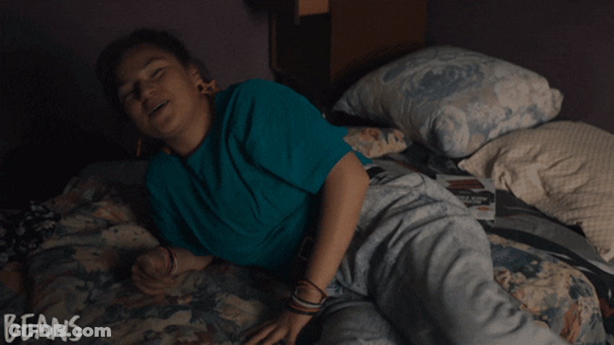 Woman Getting Into Bed You're So Funny Reaction GIF