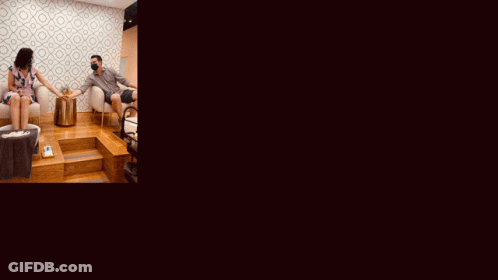 Woman Getting Nails Painted GIF