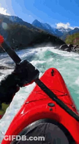 Woman Getting Out Of Kayak In Water GIF