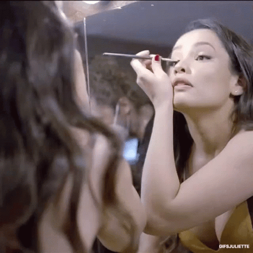 Woman Getting Ready Putting Eyeshadows On GIF