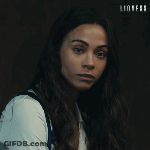 Woman Giving Middle Finger In Front Of Lioness Sign GIF