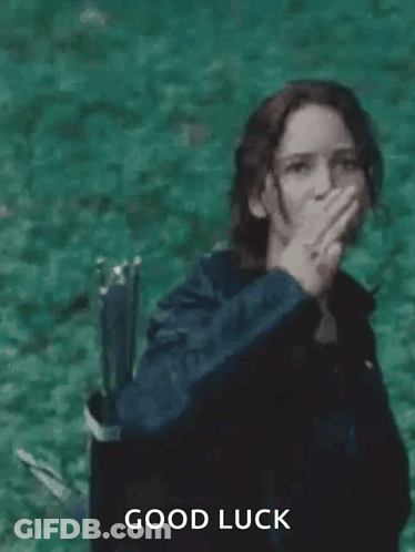Woman Giving Peace Sign By Water GIF