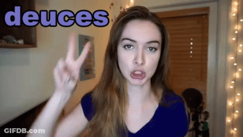 Woman Giving Peace Sign Saying Deuces GIF