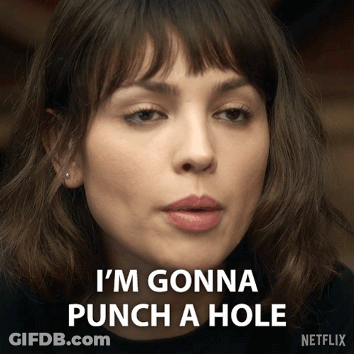Woman Gonna Punch Hole In Netflix Ad GIF