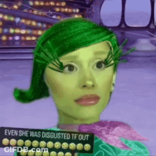 Woman Green Hair Holding Sign Disgusted TF Out GIF