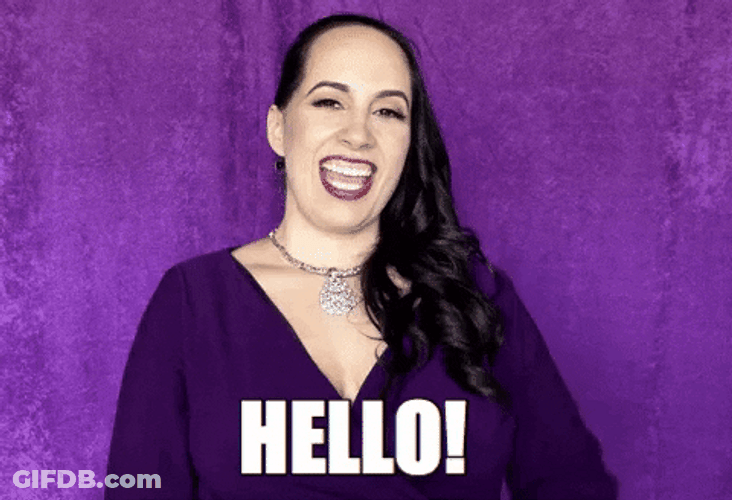 Woman Greets With Wide Smile Waving Hello Meme GIF
