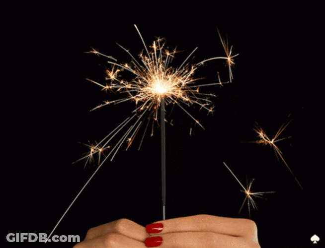Woman Hand Holding Sparkles GIF
