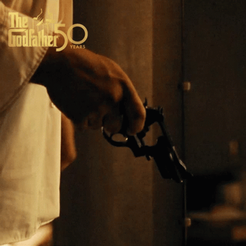 Woman Hand Loading Revolver Gun GIF