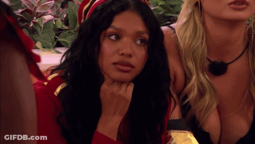 Woman Hand On Chin Looking Left GIF