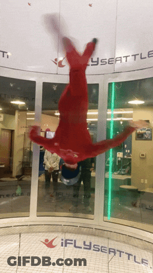 Woman Head Down Indoor Skydiving GIF