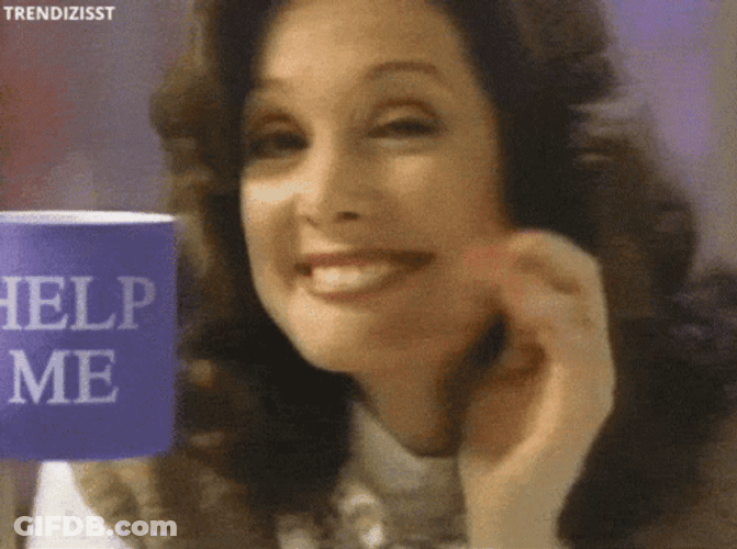 Woman Holding A Send Help Mug GIF