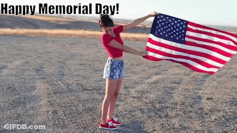 Woman Holding American Flag In Dirt Saying Happy Memorial Day GIF