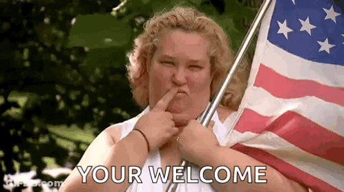 Woman Holding American Flag Saying You're Welcome GIF