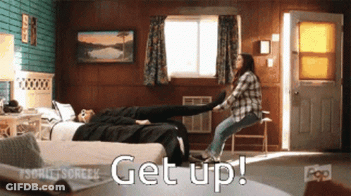 Woman Holding Another Woman's Leg Get Up GIF