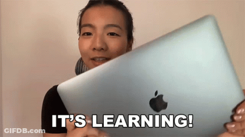 Woman Holding Apple Laptop Saying It's Learning GIF