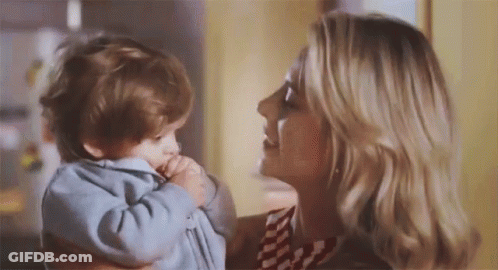 Woman Holding Baby Gazing At Her GIF