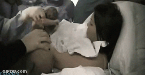 Woman Holding Baby In Hospital Bed GIF