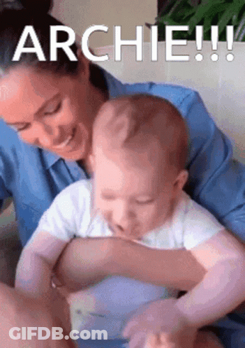 Woman Holding Baby Saying Archie GIF