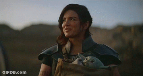 Woman Holding Baby Yoda GIF