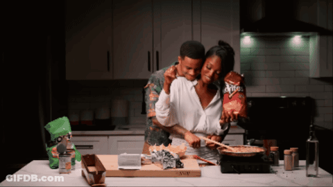 Woman Holding Bag Of Doritos GIF