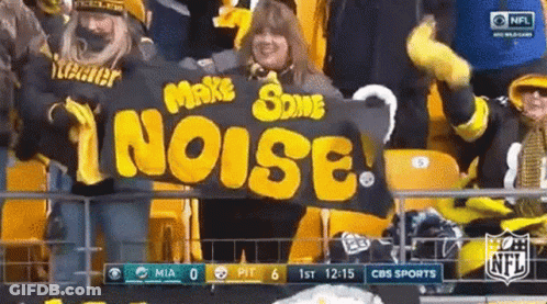 Woman Holding Banner Saying Make Some Noise GIF