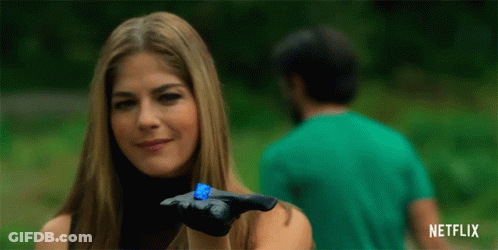 Woman Holding Blue Gummy Bear Netflix Logo GIF