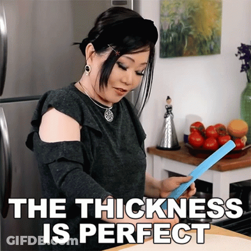 Woman Holding Blue Paper The Thickness Is Perfect GIF