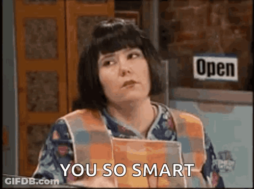 Woman Holding Book In Front Of Open Sign GIF