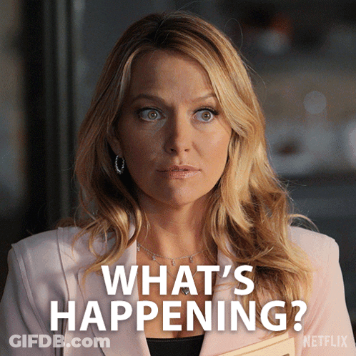 Woman Holding Book Saying What's Happening GIF