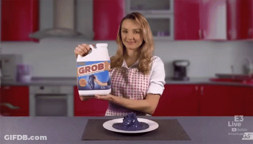 Woman Holding Bottle Of Grob GIF