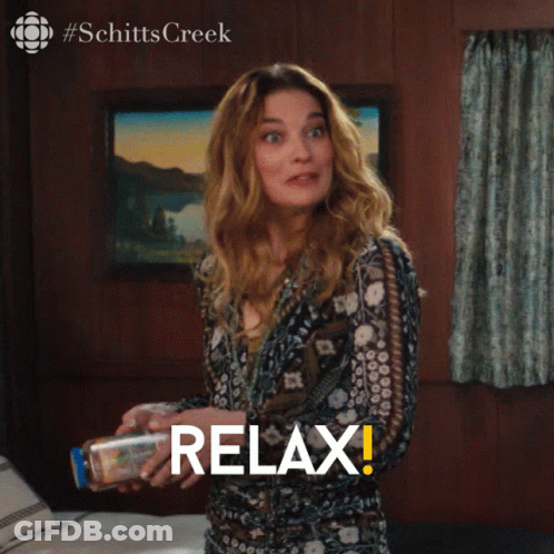 Woman Holding Bottle Saying Relax GIF
