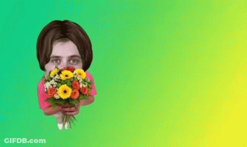 Woman Holding Bouquet Of Flowers GIF