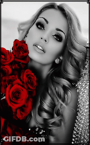 Woman Holding Bouquet Of Red Roses GIF