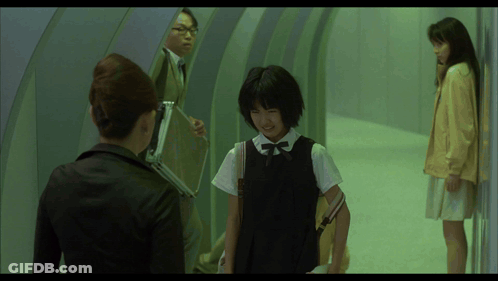 Woman Holding Briefcase Talks To Girl In Black Dress GIF