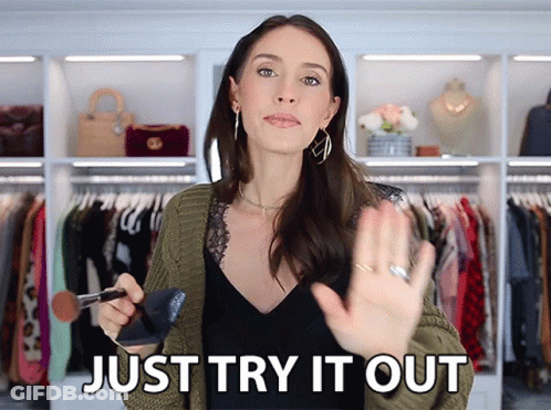 Woman Holding Brush Says Try It Out GIF