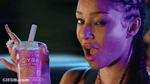Woman Holding Bubble Tea With Straw GIF